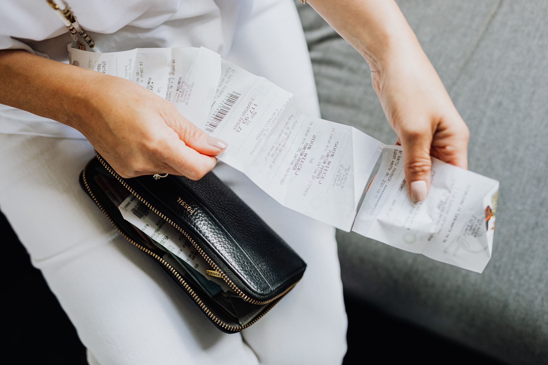 receipt in hand